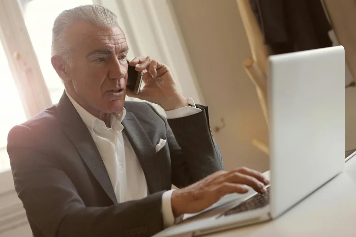 Men collaborating in a business meeting.